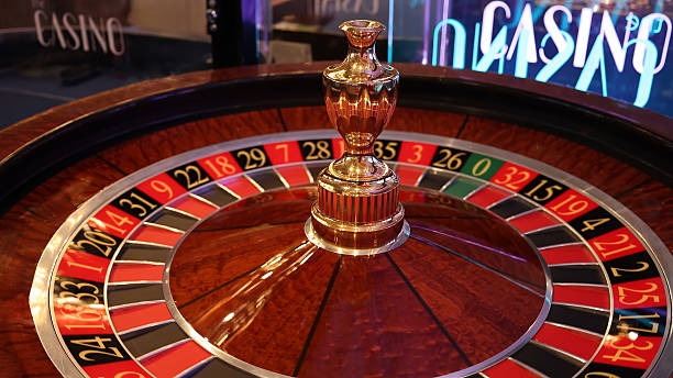 Live roulette table with dealer and wheel